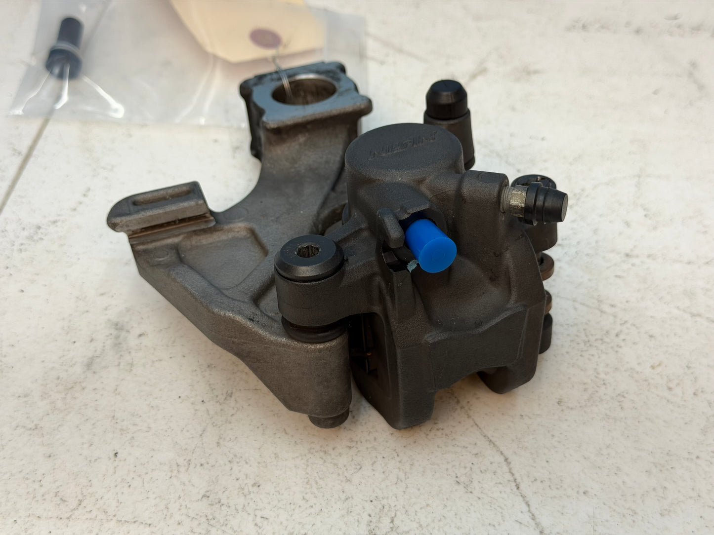 11-25 Suzuki GSXR 600 750 OEM Rear Brake Caliper Mount Bracket 69100-47H10-999
