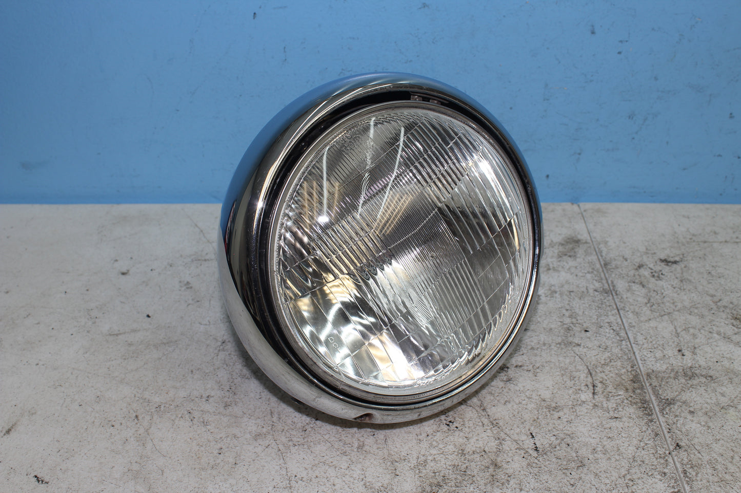 1999-2009 Yamaha XVS11AWV V Star Classic OEM Headlight w/ Mounting Bracket