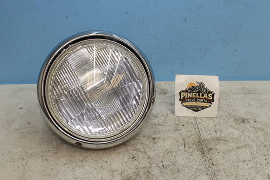 1999-2009 Yamaha XVS11AWV V Star Classic OEM Headlight w/ Mounting Bracket