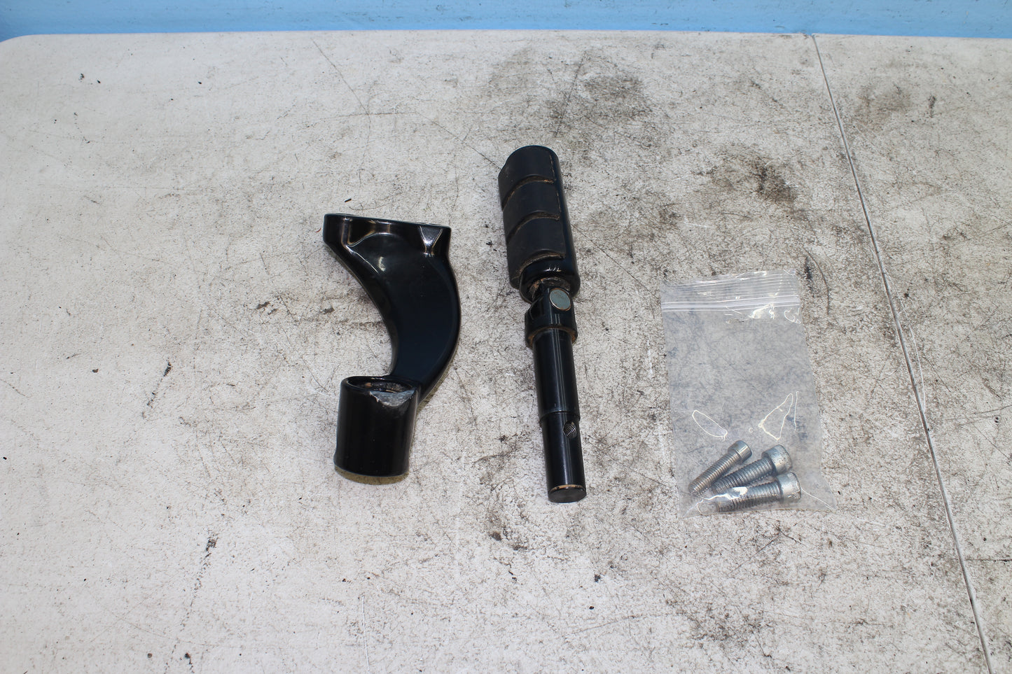 2014-2022 Harley Davidson Sportster 883 Left Driver Foot Peg w/ Mounting Bracket