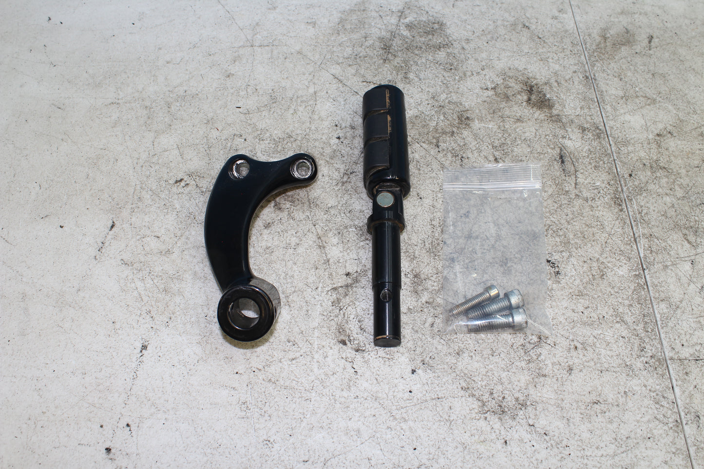 2014-2022 Harley Davidson Sportster 883 Left Driver Foot Peg w/ Mounting Bracket